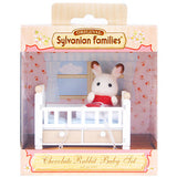 Sylvanian Families: Chocolate Rabbit Baby and Crib Bed Set.